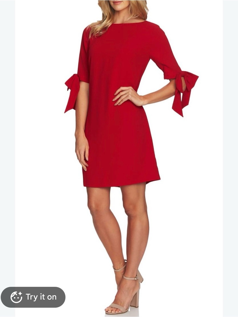 Cece red crepe shift dress with tie details at the sleeve hem.